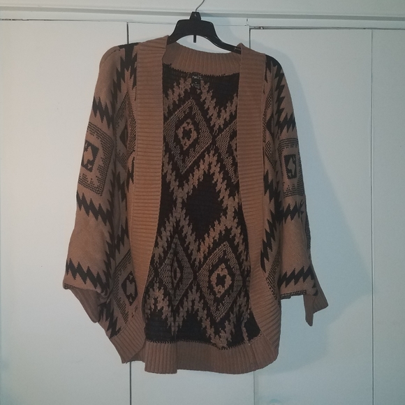 Rue21 Sweaters - Tan and black knitted shrug Rue21 Sweaters - Tan and black knitted shrug